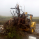 A bulldozer removes fallen trees in the seafront village of Feteira, outside Horta, on the Portuguese island of Faial.